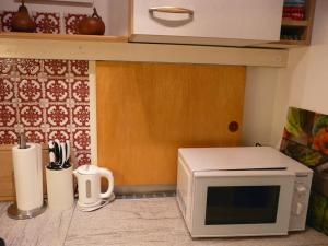 Eldhús eða eldhúskrókur á Kleine feine Wohnung in Toplage