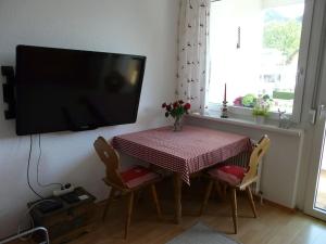 Sjónvarps- og/eða afþreyingartæki á Kleine feine Wohnung in Toplage