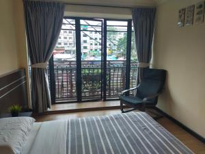 Postel nebo postele na pokoji v ubytování Hong Kong Hotel