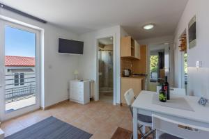 Kuchyň nebo kuchyňský kout v ubytování Apartment Vito
