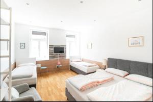 Posteľ alebo postele v izbe v ubytovaní Comfortable Apartments Vienna 1100 with contactless Check-in