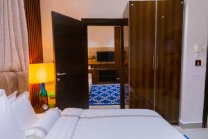 Katil atau katil-katil dalam bilik di Isglo Hotels Ikoyi