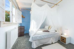 Postel nebo postele na pokoji v ubytování Finca Es Canyaret