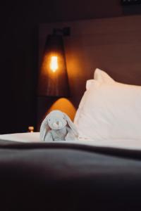 The Lamp Hotel & Spa客房内的一张或多张床位