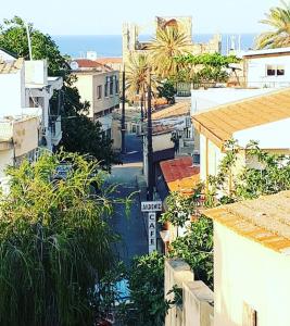 a view of a street in a city with buildings at Malia Holiday Let in Famagusta