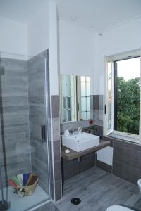 Koupelna v ubytování B&B Maison Blanche