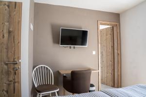 TV a/nebo společenská místnost v ubytování Hiša Poljana Rooms