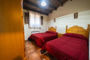 A bed or beds in a room at RuralEcofilabres