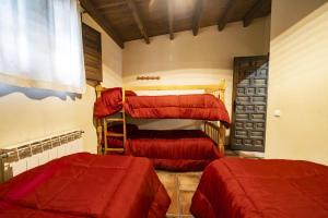 A bed or beds in a room at RuralEcofilabres