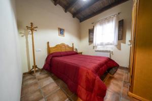 A bed or beds in a room at RuralEcofilabres