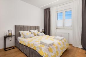 Posteľ alebo postele v izbe v ubytovaní Gallery apartment Megan2 with parking