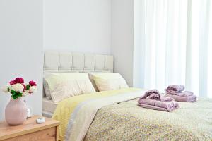 Ένα ή περισσότερα κρεβάτια σε δωμάτιο στο Modern flat in the heart of Port of Piraeus (D2)