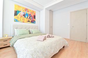 Ένα ή περισσότερα κρεβάτια σε δωμάτιο στο Modern flat in the heart of Port of Piraeus (D2)