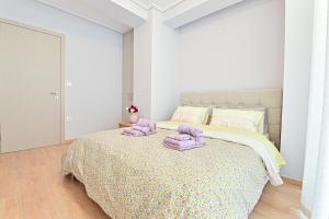 Ένα ή περισσότερα κρεβάτια σε δωμάτιο στο Modern flat in the heart of Port of Piraeus (D2)
