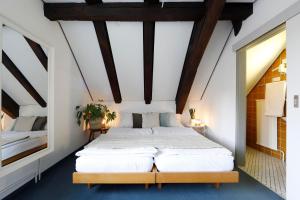 Katil atau katil-katil dalam bilik di Hotel Untertor - 24H Self Check-in