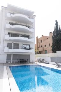Fotografia z galérie ubytovania Design Apartment with swimming pool near the beach (A1) v Aténach