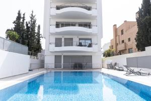 Fotografia z galérie ubytovania Design Apartment with swimming pool near the beach (A1) v Aténach