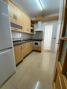 Kuchyň nebo kuchyňský kout v ubytování Armonía + 2 fotografie