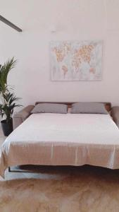 Postel nebo postele na pokoji v ubytování Zephir Apartments