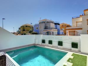 a swimming pool on the roof of a building at Casa Croft - 4609 in San Javier