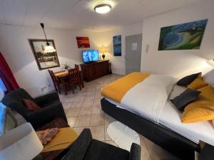 TV a/nebo společenská místnost v ubytování Strandnest Büsum