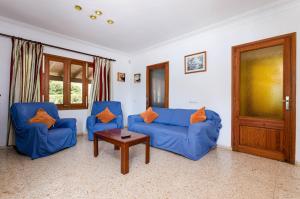 Posezení v ubytování YourHouse Can Escandeu