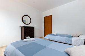 Postel nebo postele na pokoji v ubytování YourHouse Can Escandeu