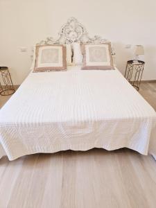 A bed or beds in a room at Villa Anna holiday house