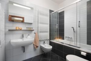 Koupelna v ubytování Apartment Leonardo + 7 fotografií