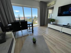 TV a/nebo společenská místnost v ubytování Starigrad Paklenica-Josipa apartmani