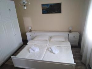 Кровать или кровати в номере Mala bašta