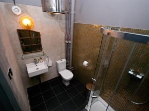 Ванная комната в LoftHotel Sen Pszczoły