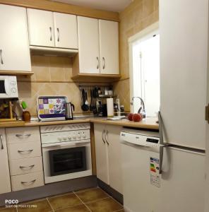 Kuchnia lub aneks kuchenny w obiekcie WIFI Los Cisnes 2 dormitorios Primera Linea playa Ayamonte Isla Canela