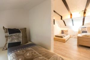 Ένα ή περισσότερα κρεβάτια σε δωμάτιο στο Ferienhaus-Chalet-Dattenfeld