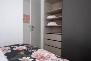 Voodi või voodid majutusasutuse Madeleine apartments - Brera toas