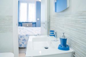 Posteľ alebo postele v izbe v ubytovaní 026 - Casa Maele 100 metri dalla SPIAGGIA, Centrale + 37 fotografií