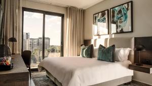 Postel nebo postele na pokoji v ubytování The Catalyst Apartment Hotel by NEWMARK + 135 fotografií