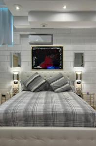 Postel nebo postele na pokoji v ubytování B&B GianLuis