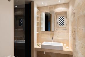 Koupelna v ubytování Suite San Giacomo - L'Opera Dell'Architetto