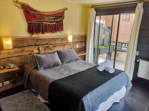 Letto o letti in una camera di Newen B&B