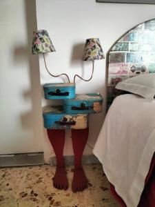 Postel nebo postele na pokoji v ubytování B&B Il MappaMondo