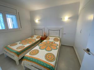Postel nebo postele na pokoji v ubytování MIRAMAR 44