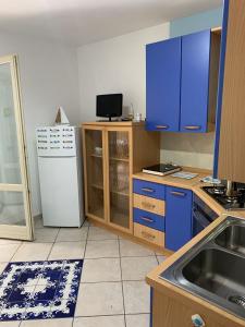 A kitchen or kitchenette at Residenza Anna Maria Még 15 kép