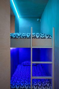Apartament Dom Szwajcara tesisinde bir ranza yatağı veya ranza yatakları