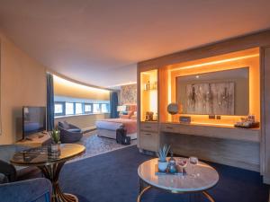 TV a/nebo společenská místnost v ubytování HYDE Hotel