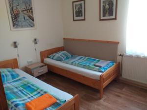 Postel nebo postele na pokoji v ubytování Hotel Amarillis