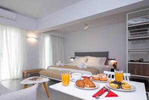 Postel nebo postele na pokoji v ubytování Electra Luxury Apartment at the Heraklion Center
