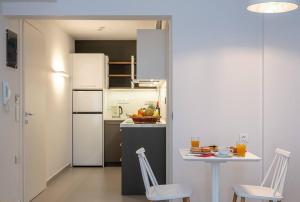 Kuchyň nebo kuchyňský kout v ubytování Electra Luxury Apartment at the Heraklion Center