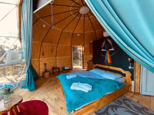 a bedroom with a bed in a tent at Paradise Inn in Batumi +59 photos