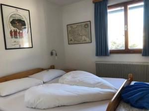 Ein Bett oder Betten in einem Zimmer der Unterkunft CHALET MARESI